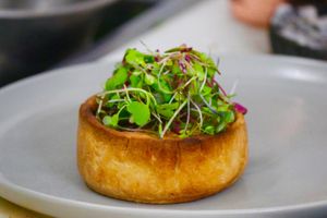 Quiche - onions, leeks, shiitake bacon, vegan cheese at L'Artisane Creative Bakery in Coral Gables