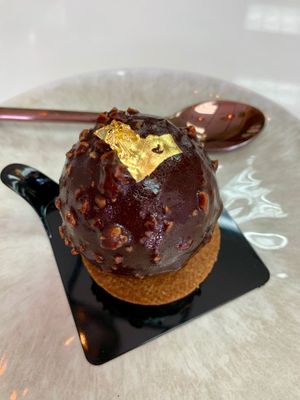 How is this even possible?? at L'Artisane Creative Bakery in Coral Gables