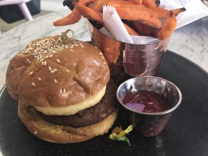Breakfast sandwich on a brioche bun at L'Artisane Creative Bakery in Coral Gables