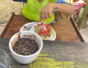Tostada de aguacate (2 piezas) frijoles y arroz extras  at El Apapacho in Merida