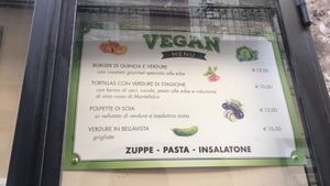Vegan menu (next to the door) at Monnalisa Caffe in Assisi