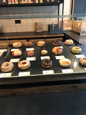 Pretty much all but 4 of these are vegan   at Crosstown Doughnuts - Soho in London