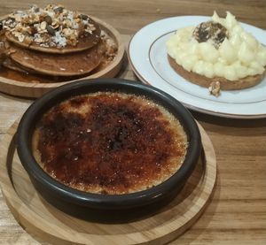Dessert crème brûlée, pancakes, lemon tart at Les Bols d'Antoine in Paris