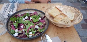 Carpaccio and bread at Les Bols d'Antoine in Paris