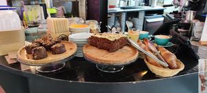 Cake and croissant at Les Bols d'Antoine in Paris