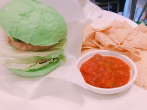 Soy meat and avocado burger with tortilla chips and salsa  at Fabius Cafe in Tokyo