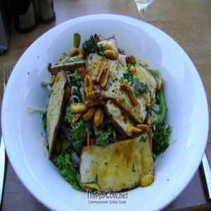 Smoked tofu with rice noodles, spicy peanuts and salad at Elemi Cafe Bar Bistro Vegetariano in Estepona
