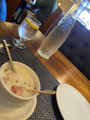 Delish Tom Kha soup, coconut base w/oyster mushrooms, onion, tomatoes & bamboo shoot (?)  at Blue Orchid in Jacksonville