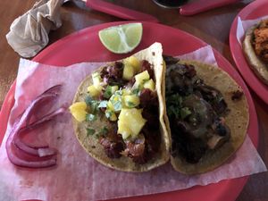 Pastor tacos with pineapple.  at Ta'consciente in Playa Del Carmen