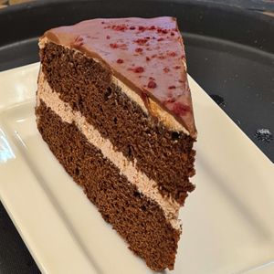 Michelle's vegan chocolate and raspberry cake at d20 Board Game Cafe - Watford in Watford