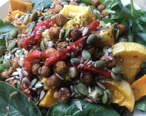 The Three Sisters. Quinoa, hearty greens, butternut squash, roasted chick peas, roasted corn, seedy mix and choice of dressings. Our most popular vegan dish.  at Veggie Go-Go in Wappingers Falls