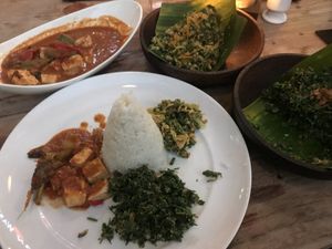 Rica rica tofu (left, back) and Urap Pakis (front right) at Batan Waru in Gianyar