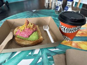 $11 , Beetroot hummus and Avo toast with Soy latte , easy done and best soy latte here   at Coco Bliss in Carindale