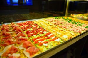 Roman pizza "al taglio" at Piccolo Uno Pizza e Caffè in Riga