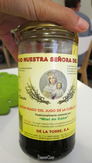 The cook came out to show me the vegan 'honey.' at Loving Hut in Malaga