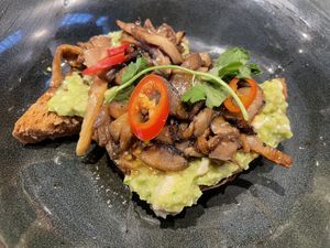 Teriyaki mushrooms on avocado toast   at LHR - Wagamama - T5 in West London