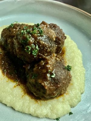Meatballs with some almond grits that would probably work better with mashed potatoes  at Alibi in Sydney