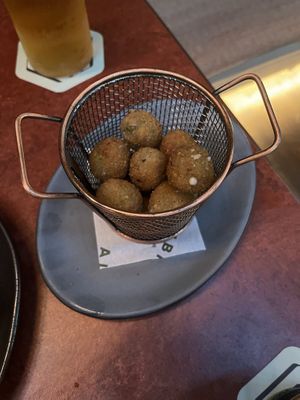 Fried olives with a feta cream inside.  at Alibi in Sydney