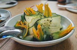 SQUASH BLOSSOMS
CASHEW PINENUT RICOTTA. ZUCCHINI RIBBONS. HERB OIL. at Alibi in Sydney