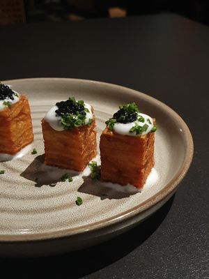 1,000 LAYER CRISPY POTATOES:  caviar, sour cream, chives at PLANTA in Miami Beach