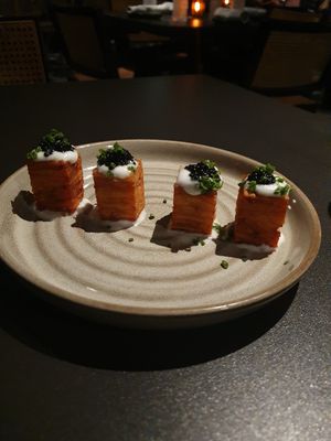 1,000 LAYER CRISPY POTATOES:

caviar, sour cream, chives at PLANTA in Miami Beach
