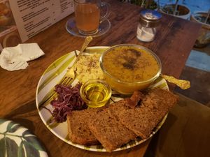 soup with hummus and bread plus side of olive and kombucha at Ayurvedico Cafe in Pokhara