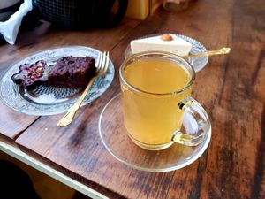 kombucha with vegan brownie and raw cashew cheese cake at Ayurvedico Cafe in Pokhara