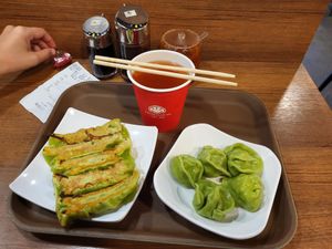 Pan fried and boiled vegan dumplings. Plum juice. 46 HKD (+1$ if you take 5+5 instead of 10 of the same dunplings) at Bafang Dumpling in Kowloon