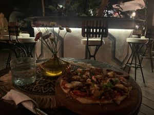 Pizza with veg sausage (on floppy pita)  at Zest Ubud in Ubud