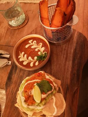 A nice starter - chips with avocado smash and tomato salsa. And sweet potato fries with bbq dip. at Zest Ubud in Ubud