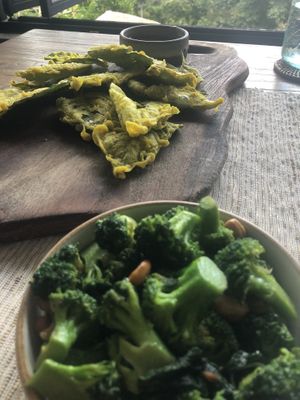Broccoli tapas and fried amaranth spinach  at Zest Ubud in Ubud