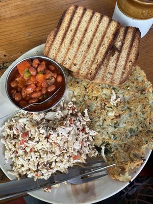 Made my own vegan breakfast. Beans, brown toast, scrambled tofu and potato rosti   at Chilly Beans in Dharamshala
