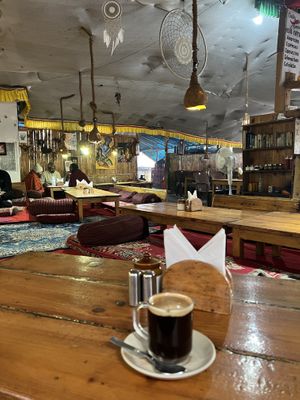 Americano and cosy seating  at Chilly Beans in Dharamshala