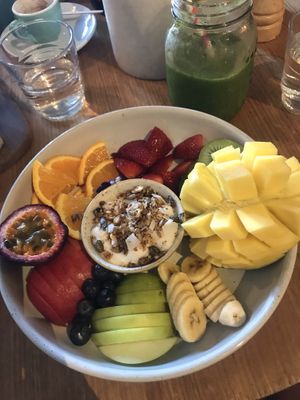 Fruit plate with vegan yogurt and granola at Preach Cafe in Bondi Beach