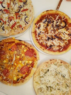 Lots of vegan pizza! at Veganeria in Budapest