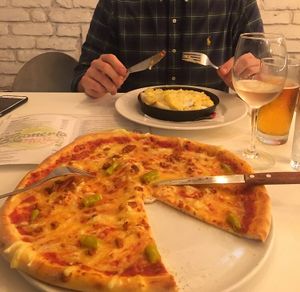 Amazing, pepperoni pizza (pepperoni was like a crumble, it was gorgeous) and cheese topped tortilla stuffed with beans 😍 at Veganeria in Budapest