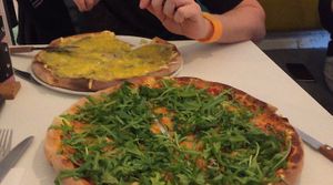 Arugula pizza at Veganeria in Budapest