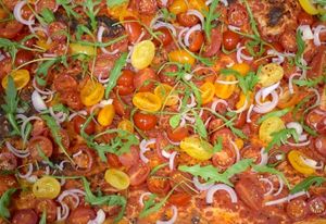 sugo, tricolore tomatini, shallots & rocket  at Baked Pizza Al Taglio  in Glasgow