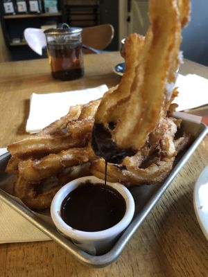 Churros with Mexican chocolate sauce  at Lorca in Stamford