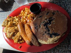 Vegan monster breakfast, with blueberry pancakes, scrambled tofu, potatoes and sausage   at The Friendly Toast in Portsmouth