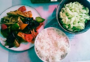 chef's special tofu meal and cucumber-garlic salad at Kytaysky Privet in Kyiv