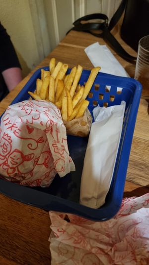 Menu with fries at Desvio Bar in Florianopolis