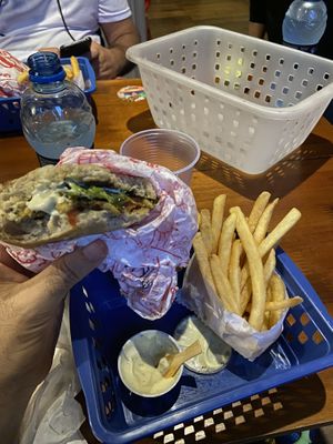 Veggy burguer with fries  at Desvio Bar in Florianopolis