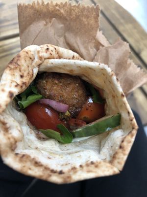 Sweet pea and mint vegan wrap from Nomad Kitchen!   She’s located to the back of the market along the side wall.  So good!  at St George's Market in Belfast