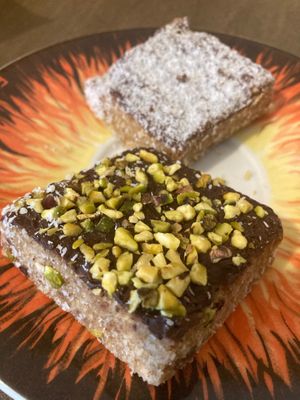 Energy bars! Dates and nuts covered with chocolate, coconut and pistacchio  at Foodie Fresh Market in Rome