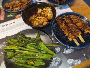 Mushroom skewers with garlic greens and bang-bang cauliflower at Wagamama - Leopold Sq in Sheffield