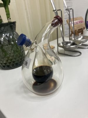 fancy soya sauce bottle on each table  at Wutai Yun in Beijing