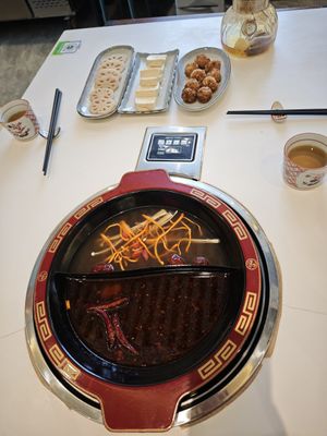 Hot pot with double flavour and the side dishes at Wutai Yun in Beijing