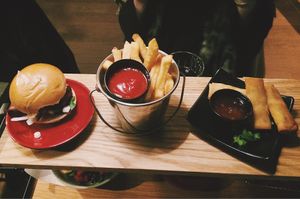 Oumph burger, fries, spring rolls with sweet & sour sauce. at Pinchos in Stockholm