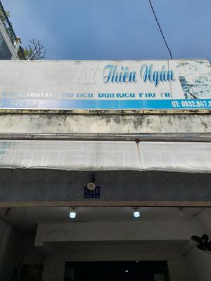 Old faded sign outside at Thien Ngan in Ho Chi Minh City